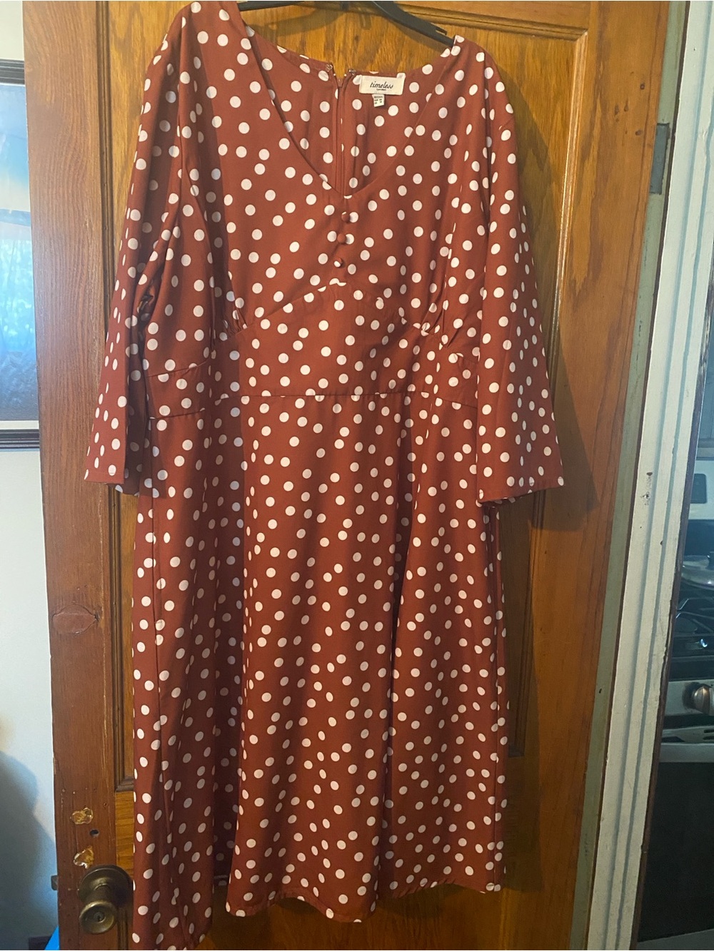 Polka Dot V-Neck Midi Dress in Rust by Magnolia
